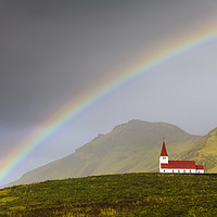 Buy canvas prints of Rainbow Over Vik Church, Iceland by Heidi Stewart