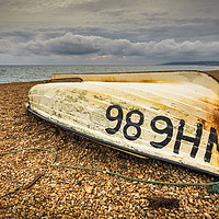 Buy canvas prints of Upturned Fishing Boat, Dorset by Heidi Stewart