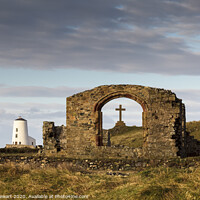 Buy canvas prints of St. Dwynwen's Church Remains, Her Cross and a Ligh by Heidi Stewart