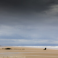 Buy canvas prints of Sker Beach Wreck, near Porthcawl in South Wales.  by Heidi Stewart