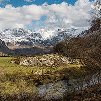 Buy canvas prints of Snow covered mountains in the Ogwen Valley, Snowdo by Richard Morgan