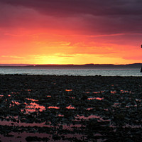 Buy canvas prints of Sunset over Whiteford Lighthouse, Gower, South Wal by Richard Morgan