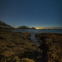 Buy canvas prints of Bracelet Bay with the stars by Richard Morgan