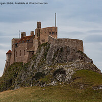 Buy canvas prints of Lindisfarne Castle. by Richard Morgan