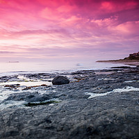 Buy canvas prints of Sunrise at Bamburgh Castle by Anthony Simpson