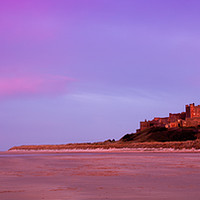 Buy canvas prints of Bamburgh Castle and beach by Anthony Simpson