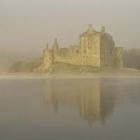 Buy canvas prints of Kilchurn Castlle in Morning Mist by Matt Johnston