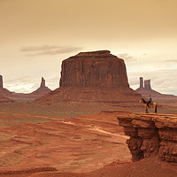Buy canvas prints of Lone Horseman Overlooks Monument Valley by Toby Bennett