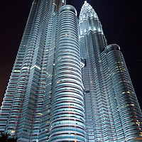 Buy canvas prints of The Petronas Towers by Toby Bennett