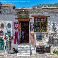 Buy canvas prints of Craft Shop in Pampaneira in Andalusia, Spain by Angus McComiskey