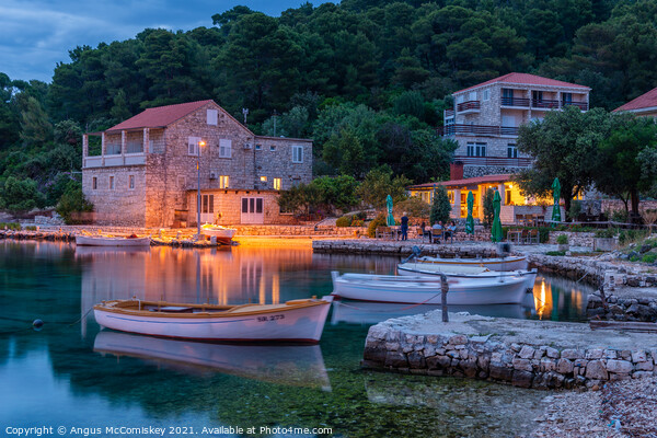 Boats tied up in Pomena harbour at dusk, Croatia Picture Board by Angus McComiskey
