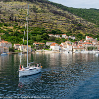 Buy canvas prints of Yacht departing Vis Island, Croatia by Angus McComiskey