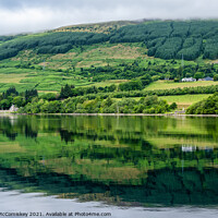 Buy canvas prints of Reflections on Loch Tay, Perthshire by Angus McComiskey