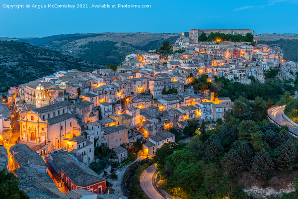 Ragusa lower town at dusk, Sicily Picture Board by Angus McComiskey