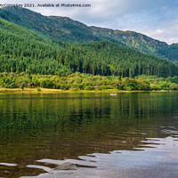 Buy canvas prints of Paddle boarder on Loch Lubnaig by Angus McComiskey