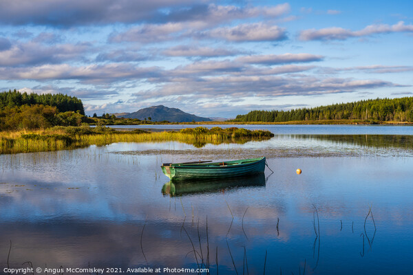 Fisherman’s boat on Loch Peallach, Isle of Mull Picture Board by Angus McComiskey