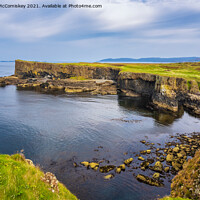 Buy canvas prints of Sea cliffs on west coast of Isle of Staffa by Angus McComiskey