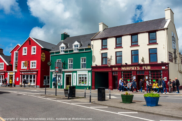 Colourful buildings in Dingle Town, County Kerry Picture Board by Angus McComiskey