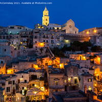 Buy canvas prints of View across Sassi District of Matera by night by Angus McComiskey