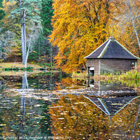 Buy canvas prints of Boathouse on Loch Dunmore, autumn colours by Angus McComiskey