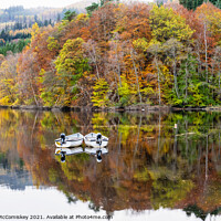Buy canvas prints of Boats moored on Loch Faskally, Perthshire by Angus McComiskey