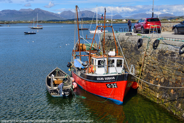 Fishing boat in Roundstone harbour, County Galway  Picture Board by Angus McComiskey