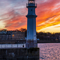 Buy canvas prints of Newhaven Lighthouse at sunset, Edinburgh by Angus McComiskey