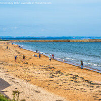 Buy canvas prints of East Sands beach at St Andrews in Fife, Scotland by Angus McComiskey