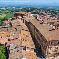 Buy canvas prints of Across the rooftops of Montepulciano, Tuscany by Angus McComiskey