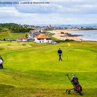 Buy canvas prints of Golfers on green at Glen Golf Course North Berwick by Angus McComiskey