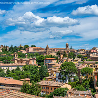 Buy canvas prints of Across the rooftops of Perugia, Umbria by Angus McComiskey