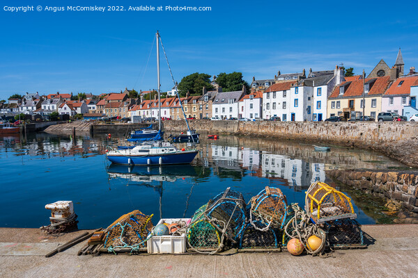 Lobster pots on quayside at St Monans harbour Picture Board by Angus McComiskey