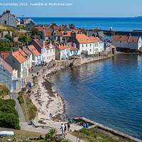 Buy canvas prints of Colourful seafront houses in Pittenweem by Angus McComiskey
