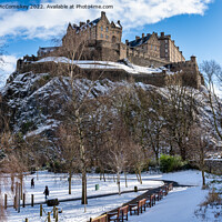 Buy canvas prints of Edinburgh Castle from Princes Street Gardens snow by Angus McComiskey