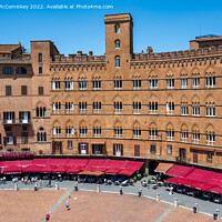 Buy canvas prints of Medieval buildings in Piazza del Campo in Siena by Angus McComiskey