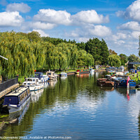 Buy canvas prints of Boats moored on the River Great Ouse at Ely by Angus McComiskey