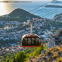 Buy canvas prints of Dubrovnik cable car ascending, Croatia by Angus McComiskey