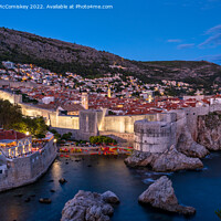 Buy canvas prints of Old walled city of Dubrovnik at dusk, Croatia by Angus McComiskey