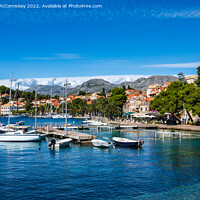 Buy canvas prints of Boats moored in Cavtat harbour in Croatia by Angus McComiskey