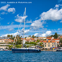 Buy canvas prints of Yachts anchored on Cavtat waterfront in Croatia by Angus McComiskey