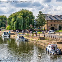 Buy canvas prints of Boats on the River Great Ouse at Ely by Angus McComiskey