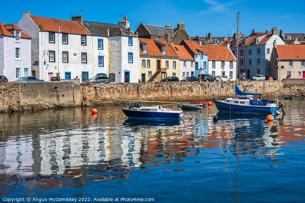 Colourful reflections in St Monans harbour Picture Board by Angus McComiskey