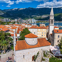 Buy canvas prints of Across the red tiled rooftops of Budva, Montenegro by Angus McComiskey