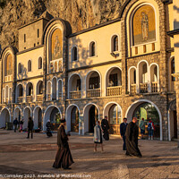 Buy canvas prints of Ostrog Monastery in Montenegro at golden hour by Angus McComiskey
