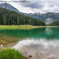 Buy canvas prints of The Black Lake and Međjed Peak, Montenegro by Angus McComiskey