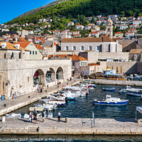 Buy canvas prints of Early morning in Dubrovnik harbour, Croatia by Angus McComiskey