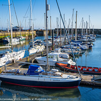 Buy canvas prints of Boats moored in Anstruther harbour in Fife by Angus McComiskey
