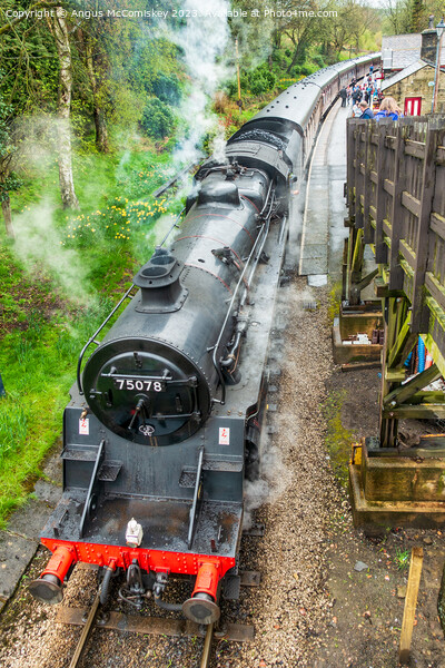 Steam locomotive 75078 departing Haworth Station Picture Board by Angus McComiskey