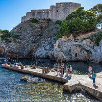 Buy canvas prints of Lovrijenac Fortress and Kolorina Bay, Dubrovnik by Angus McComiskey