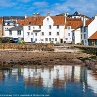 Buy canvas prints of Whitewashed stone houses on Pittenweem harbour by Angus McComiskey